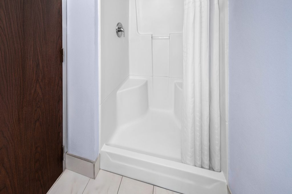 Accessible walk-in shower in an ADA guest room at Travelodge by Wyndham Milwaukee