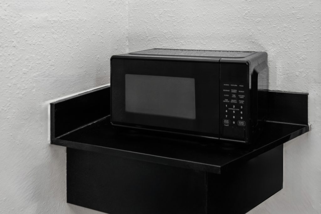 In-room microwave and mini-refrigerator at Travelodge by Wyndham Milwaukee