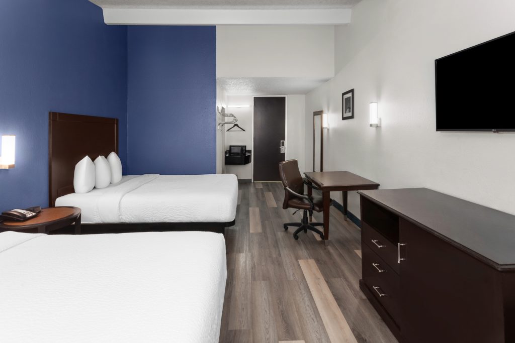 Two queen bed room with balcony at Travelodge by Wyndham Milwaukee