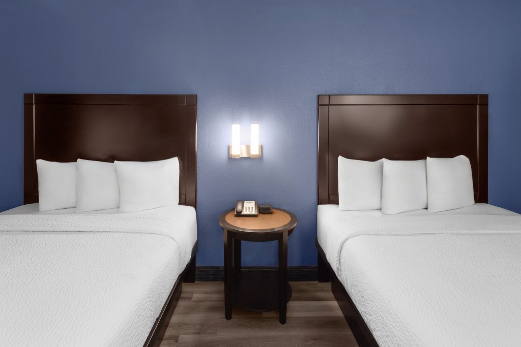 Two queen beds guest room at Travelodge by Wyndham Milwaukee