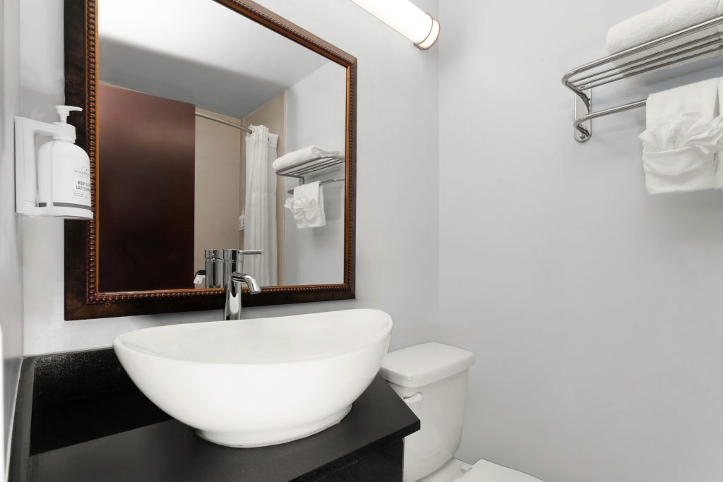 Bathroom in the deluxe king studio suite at Travelodge by Wyndham Milwaukee