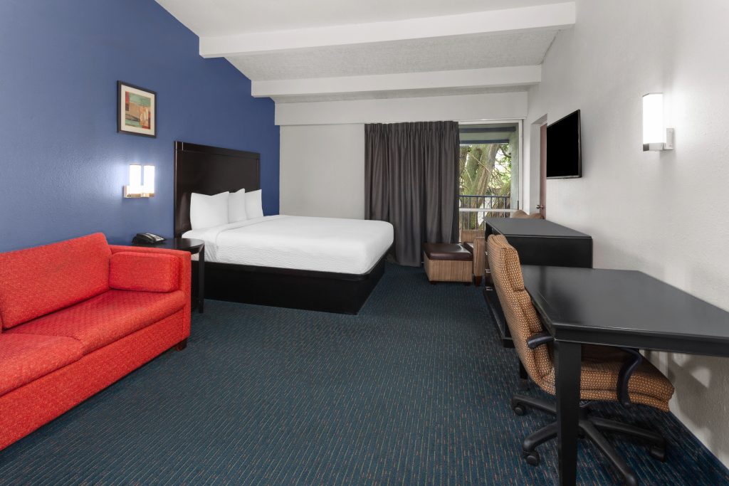 King studio suite with sofa bed and king bed at Travelodge by Wyndham Milwaukee